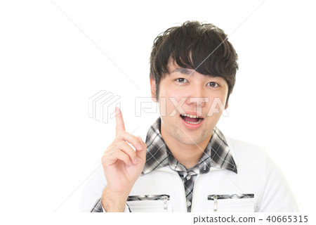 A smiling male to point A smiling male to point 40665315