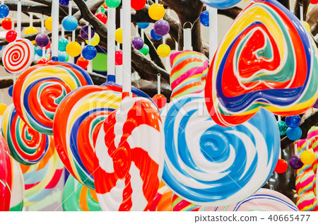 Round lollipops in candy shop. Sweets background Round lollipops in candy shop. Sweets background 40665477