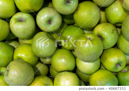 Background of green apples close-up shallow depth of field 40667331