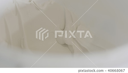 white putty ready to apply in a bucket 40668067