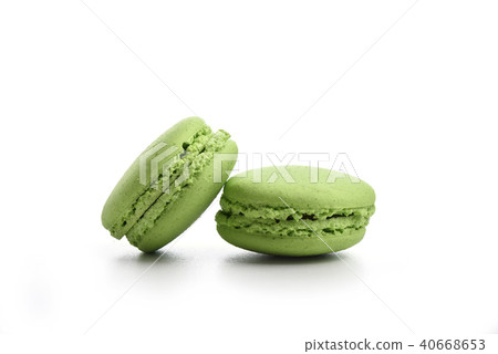 Two green macaroons isolated on white 40668653