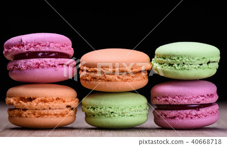 Colourful and sweet french macaroons 40668718
