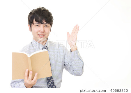 A smiling male teacher A smiling male teacher 40668820