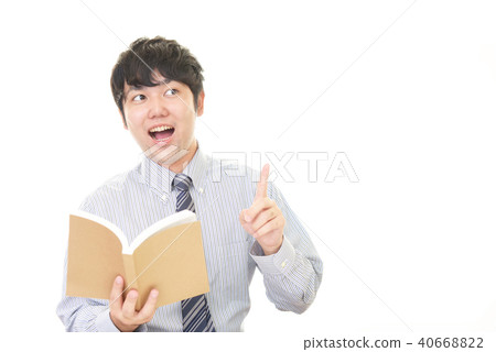 A smiling male teacher 40668822