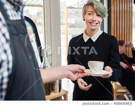 barista serve cup client hipster girl coffee shop barista serve cup client hipster girl coffee shop 40668968