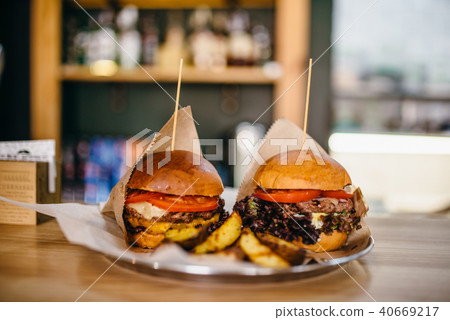 Fresh grilled burgers and on the table 40669217