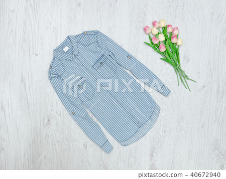 Blue striped shirt and a bouquet of tulips Blue striped shirt and a bouquet of tulips 40672940