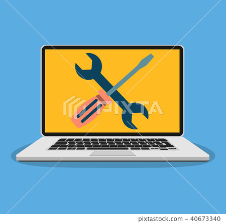 Laptop with wrench and screwdriver on screen. 40673340