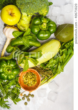 Green vegetables on a white background. Green vegetables on a white background. 40673820
