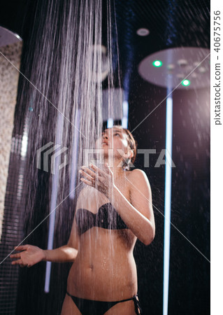 female swimmer is having shower female swimmer is having shower 40675756
