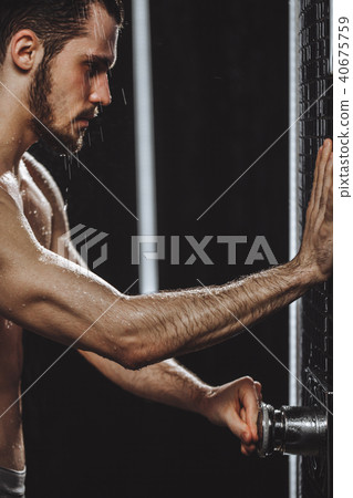 naked man is turning on the shower 40675759