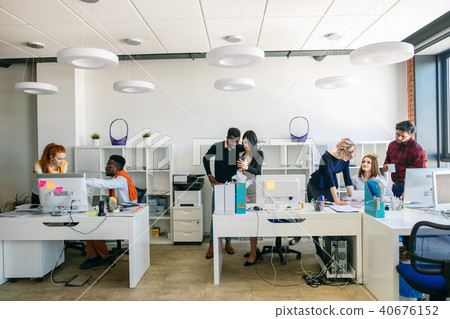 talented multiethnic people performing their job at workplace talented multiethnic people performing their job at workplace 40676152