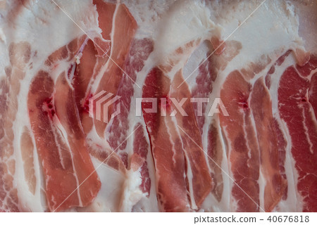 Pork raw meat slides on dish at BBQ. restaurant 40676818