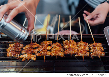 Mala grilled meat with sichuan pepper at market Mala grilled meat with sichuan pepper at market 40677043