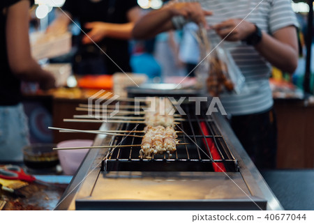 Mala grilled meat with sichuan pepper at market 40677044