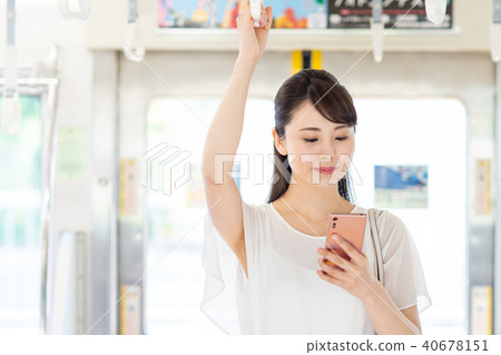 Business woman (train, smartphone) Business woman (train, smartphone) 40678151