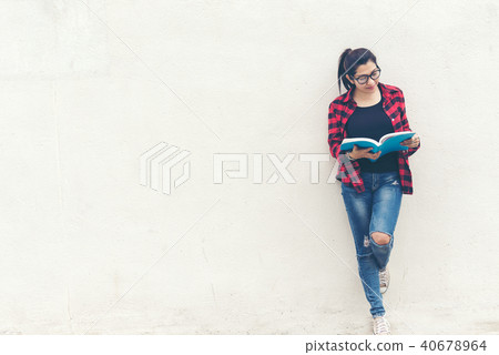 Asian woman standing and holding Asian woman standing and holding 40678964