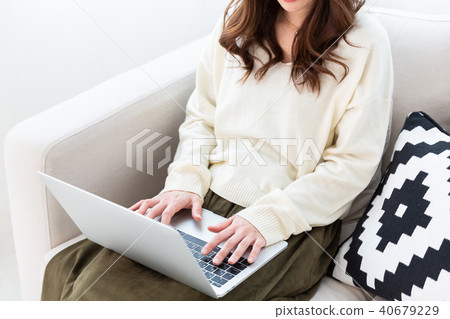 Female hand to use laptop computer Female hand to use laptop computer 40679229