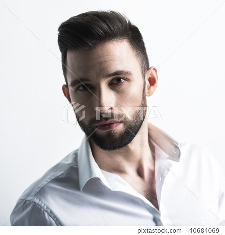 Handsome man in white shirt. Closeup portrait. Handsome man in white shirt. Closeup portrait. 40684069