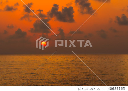Beautiful orange sunset over the calm sea 40685165