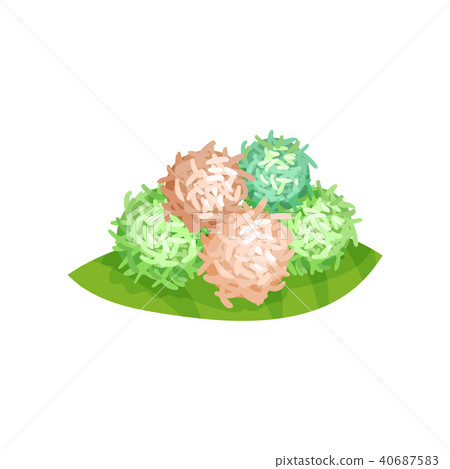 Klepon or sweet glutinous rice balls with palm sugar on green leaf. Traditional Indonesian dessert 40687583