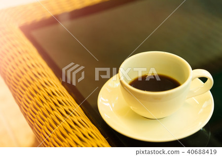 Coffee cup in coffee shop - add flare effect Coffee cup in coffee shop - add flare effect 40688419