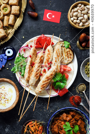 Traditional turkish kebab or kabob, turkish sweets, yogurt sauce and roasted vegetables 40689970