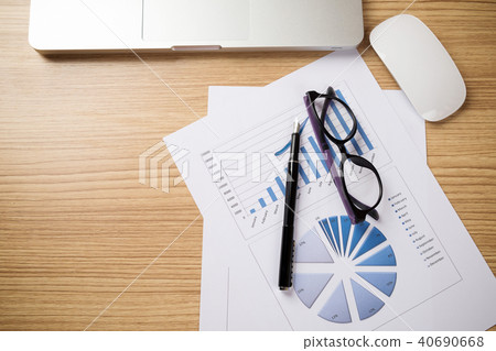 Desk office with laptop,pen, analysis report Desk office with laptop,pen, analysis report 40690668