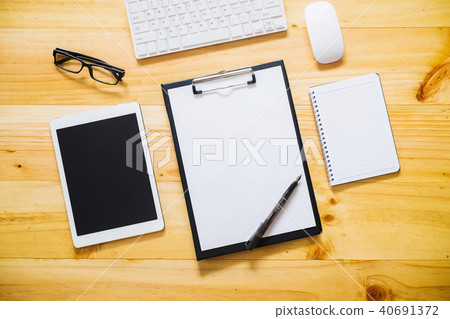 Office desk table with computer, supplies, laptop Office desk table with computer, supplies, laptop 40691372