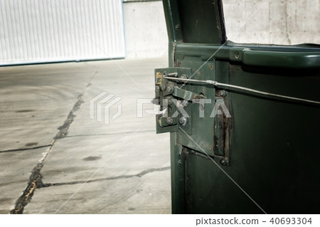 A device for opening a car door made of steel. A device for opening a car door made of steel. 40693304