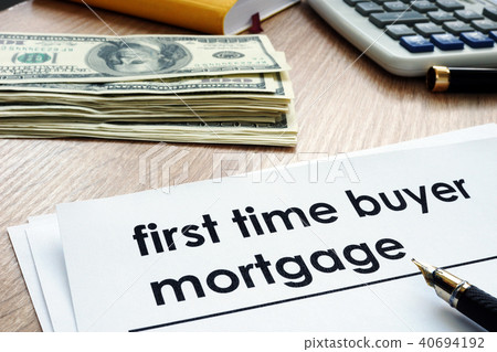 First time buyer mortgage form on a desk. First time buyer mortgage form on a desk. 40694192