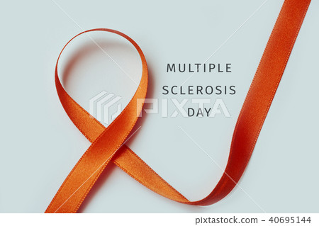 orange ribbon and text multiple sclerosis day 40695144