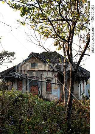 Damaged ancient villa 40695162