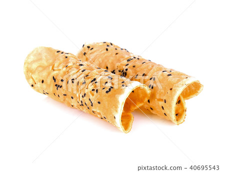 Black sesame chips on white background Black sesame chips on white background 40695543
