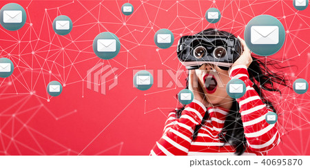 Emails with woman using a virtual reality headset Emails with woman using a virtual reality headset 40695870