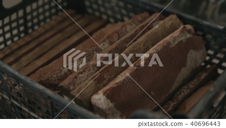 brick cuts tile in the container brick cuts tile in the container 40696443