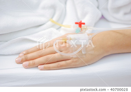 A patient in the hospital with saline intravenous A patient in the hospital with saline intravenous 40700028