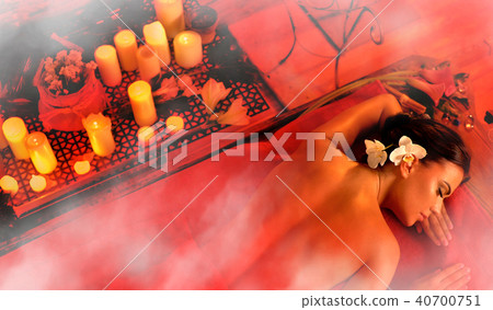 Massage of woman in spa salon. Luxary interior oriental therapy . Massage of woman in spa salon. Luxary interior oriental therapy . 40700751
