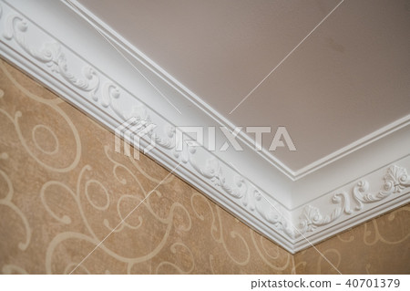 Luxury Home ceiling corner ornamental moulding detail Luxury Home ceiling corner ornamental moulding detail 40701379