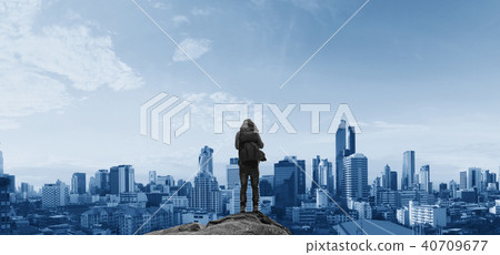 a man with backpack standing looking city view a man with backpack standing looking city view 40709677