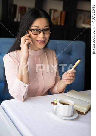 Beautiful businesswoman make call Beautiful businesswoman make call 40711689