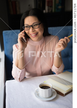 Beautiful businesswoman make call Beautiful businesswoman make call 40711704