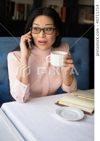 Beautiful businesswoman make call Beautiful businesswoman make call 40711714