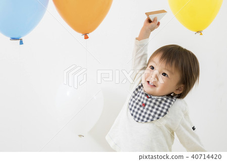 Infant boy playing in a balloon 40714420