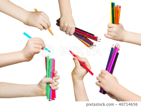 Set of child hands holding pencils and felt pens Set of child hands holding pencils and felt pens 40714656
