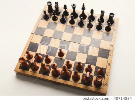 Chessboard with figures in progress 40714884