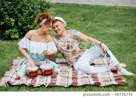 Young laughing couple playing drums 40716735