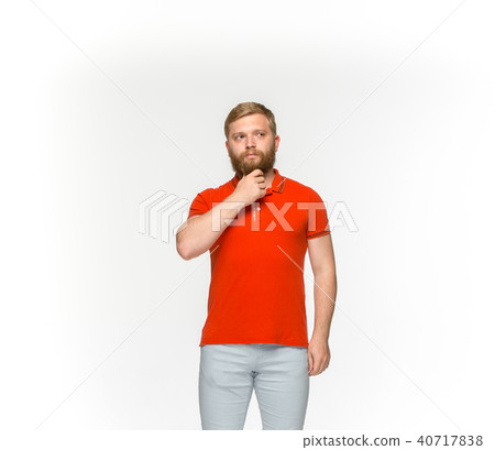 Closeup of young man's body in empty red t-shirt isolated on white background. Mock up for disign Closeup of young man's body in empty red t-shirt isolated on white background. Mock up for disign 40717838