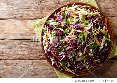 Vegetarian salad of white and red cabbage Vegetarian salad of white and red cabbage 40717840