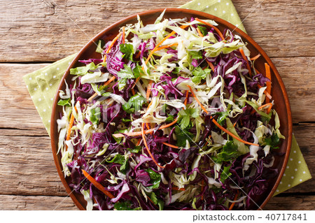 Mix salad of white and red cabbage with carrots Mix salad of white and red cabbage with carrots 40717841